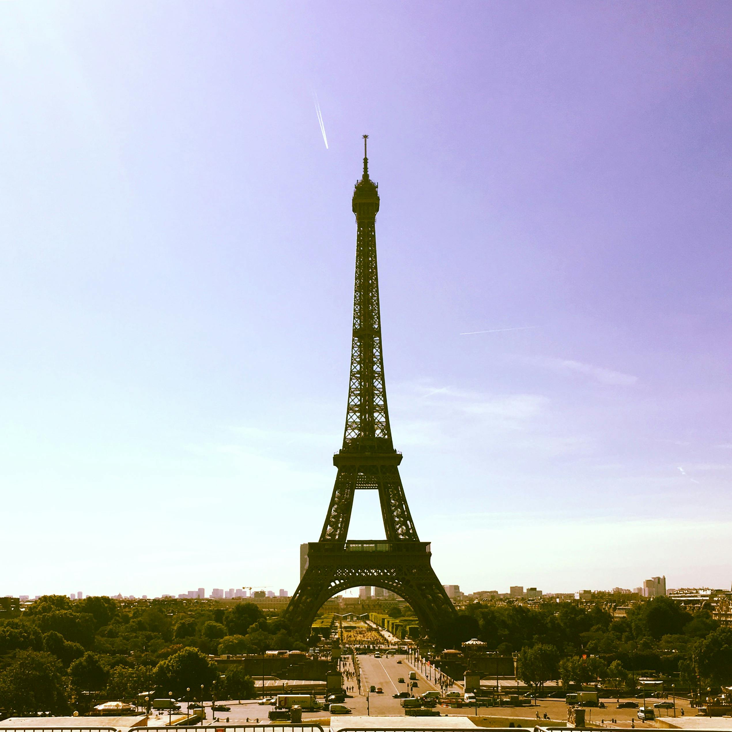 Stunning view of the Eiffel Tower against a clear blue sky in Paris, France.